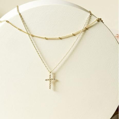 Damen Halskette mit funkelndem Kreuzanhänger und doppellagigem Design Shop Nory