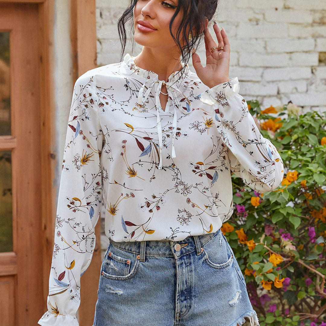 Damen Leichte Chiffon-Bluse mit Volantkragen, Krawattenverschluss und floralem Print Shop Nory