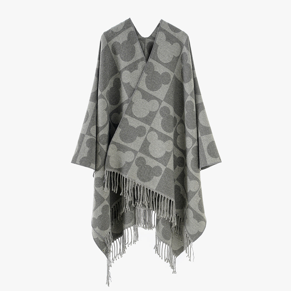 Damen Oversize-Jacquardponcho mit grafischem Kopf-Silhouettenmuster und Fransen Shop Nory