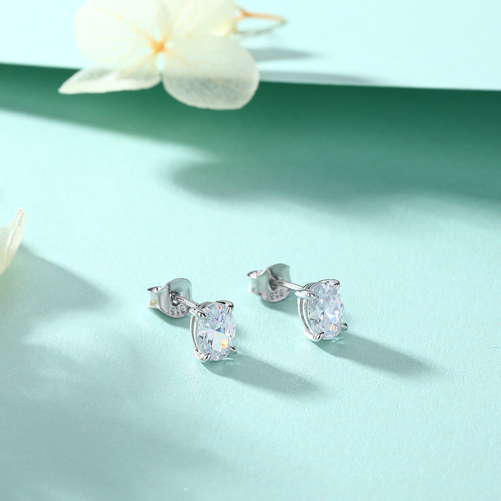 Damen Ohrstecker mit ovalem Zirkonia-Besatz und elegantem Edelstahlrahmen Shop Nory