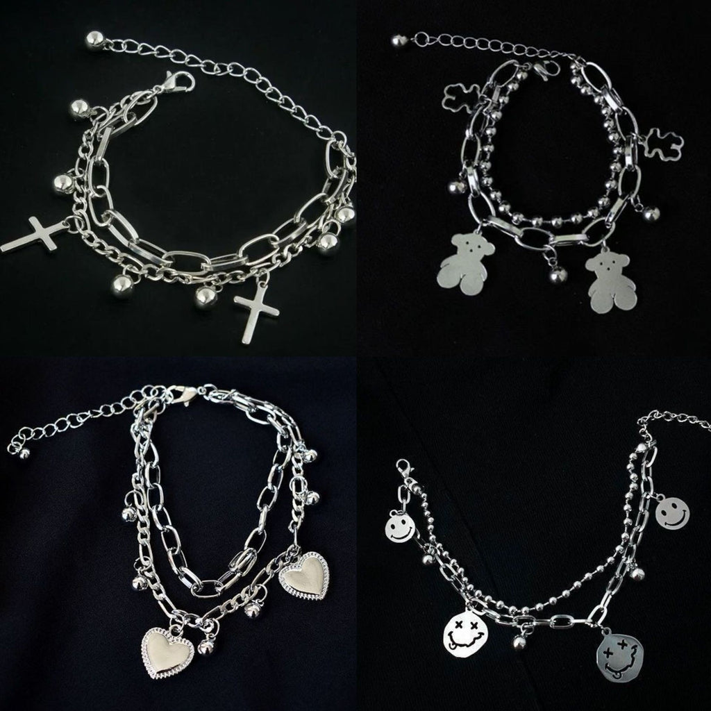 Damen Charm-Armband aus hochwertigem Edelstahl mit verspieltem Bären-Anhänger Shop Nory