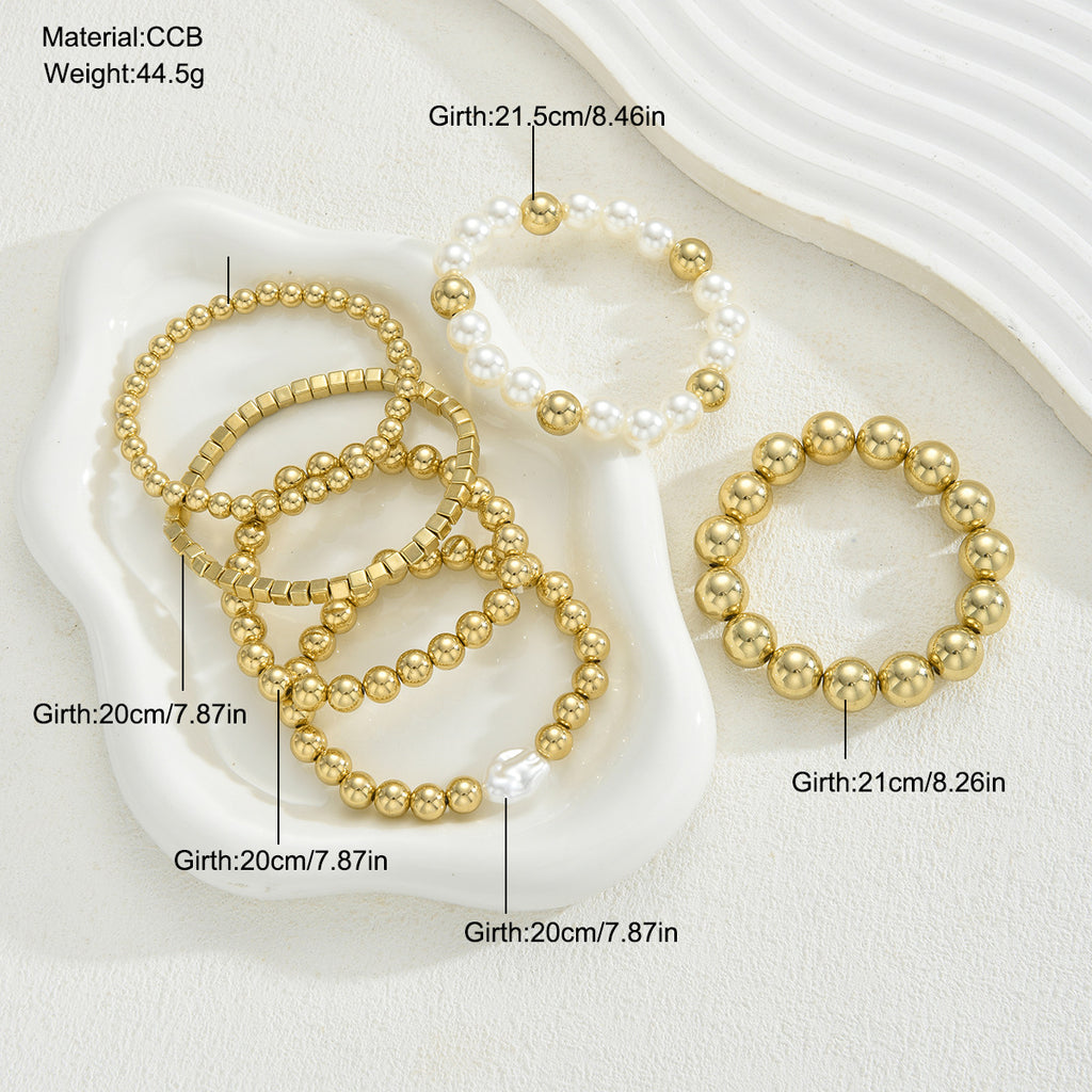 Damen Armreif-Set mit eleganten, glänzenden Kugeln und Perlen Shop Nory