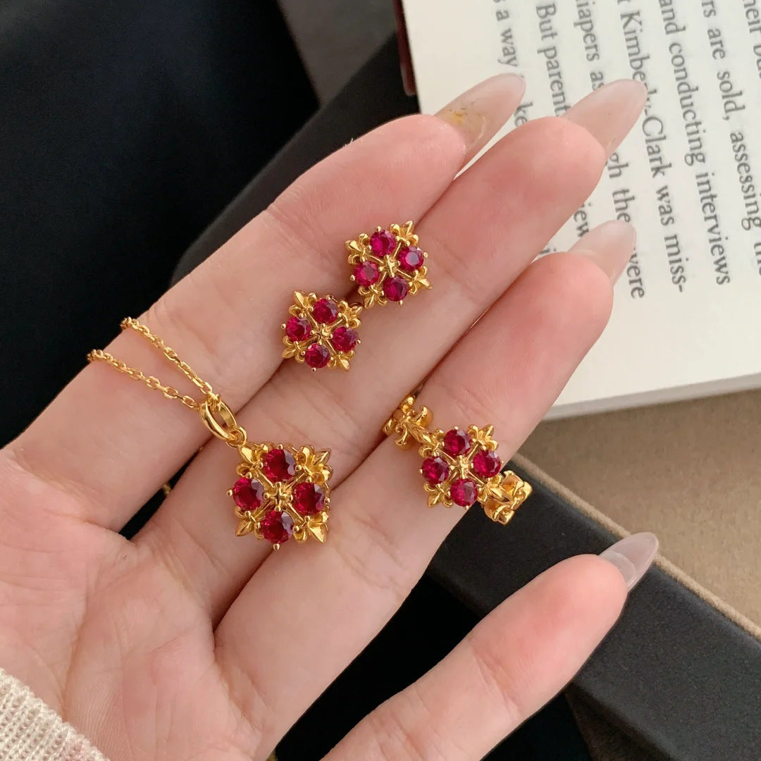 Damenring mit floralen Akzenten und edlen Rubinen Shop Nory