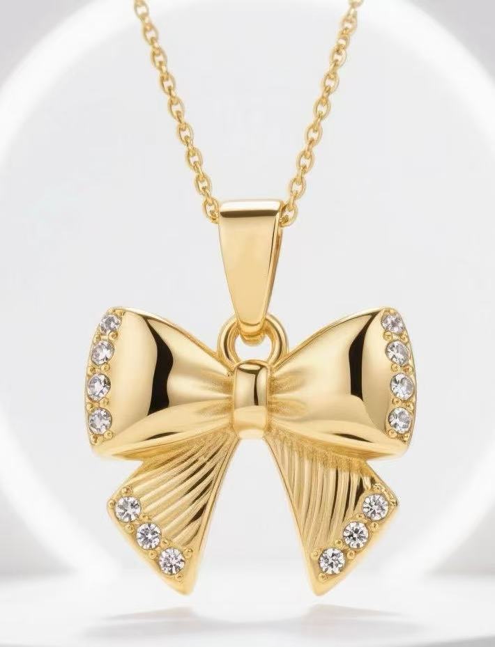 Damen Halskette mit elegantem Schleifen-Anhänger und funkelnden Zirkonia-Details Shop Nory