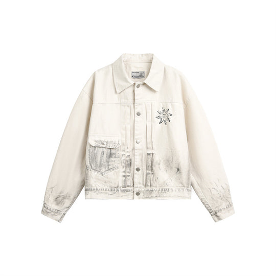 Unisex Boxy-Jeansjacke mit verwaschenem Paint‑Effekt und dezenter Stickerei Shop Nory