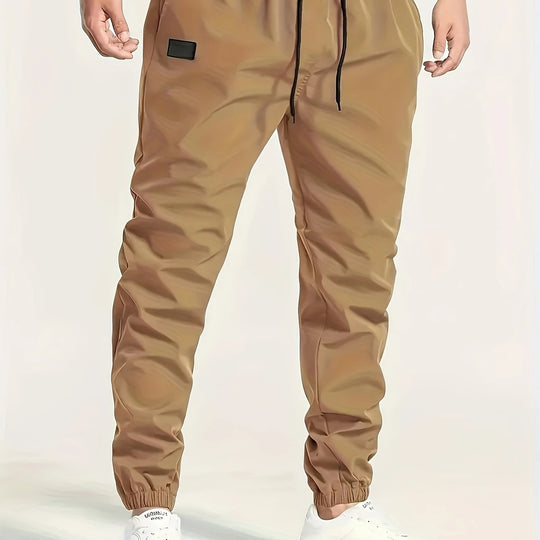 Herren Slim‑Tapered Tech‑Joggerhose mit Tunnelzugbund, elastischen Knöchelbündchen und funktionalen Seitentaschen Shop Nory