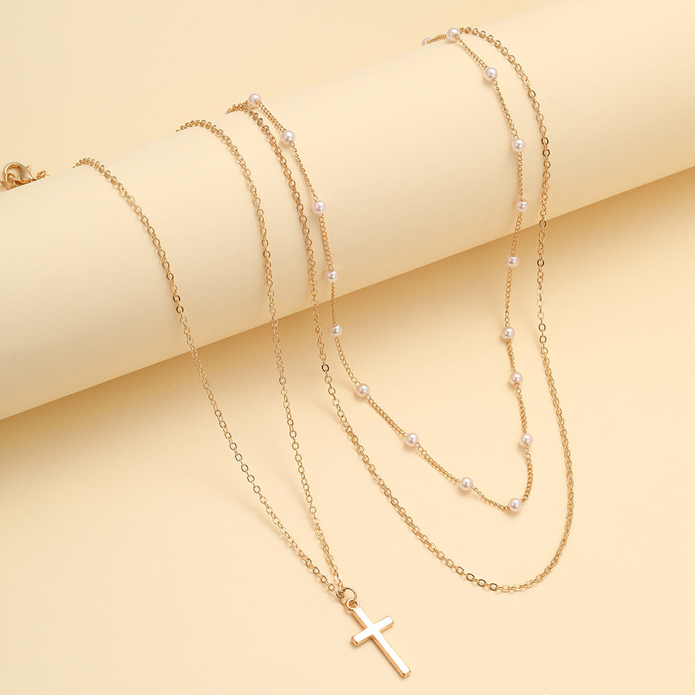 Damen Halskette mit mehrlagigem Perlen- und Kreuzdesign Shop Nory