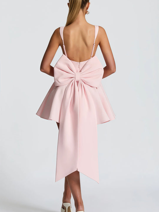 Damen Cocktailkleid mit oversized Schleifen-Design und fließendem Rock