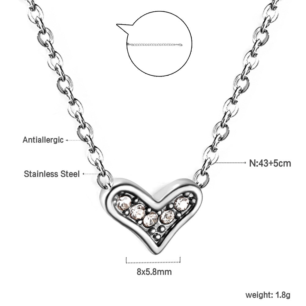 Damen Halskette mit funkelndem Herzanhänger aus goldplattiertem Edelstahl Shop Nory