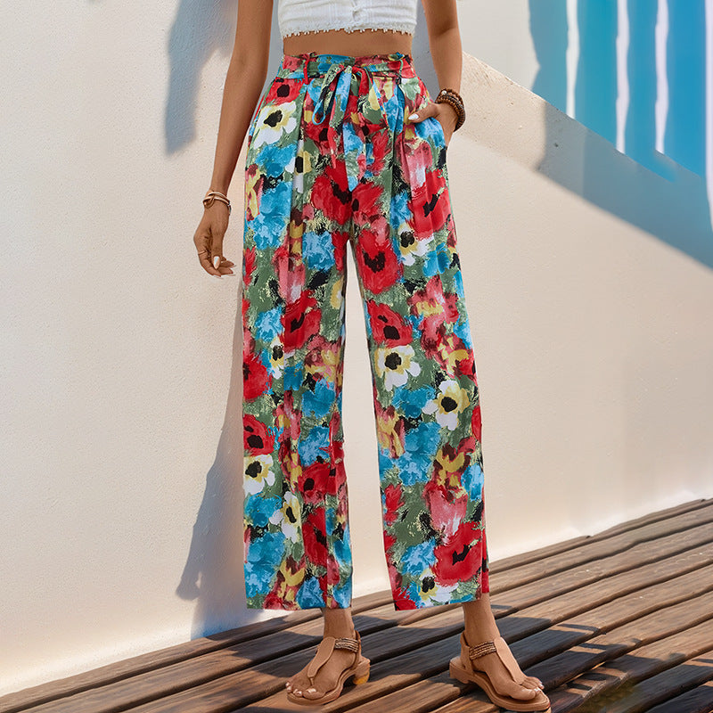 Damen Leichte High‑Waist Marlenehose mit floralem Aquarellprint, weitem Bein & Bindegürtel Shop Nory