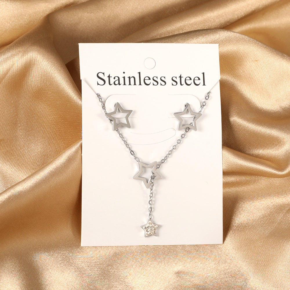 Damen Schmuckset mit goldplattierten Sternanhängern und funkelnden Zirkonia Shop Nory