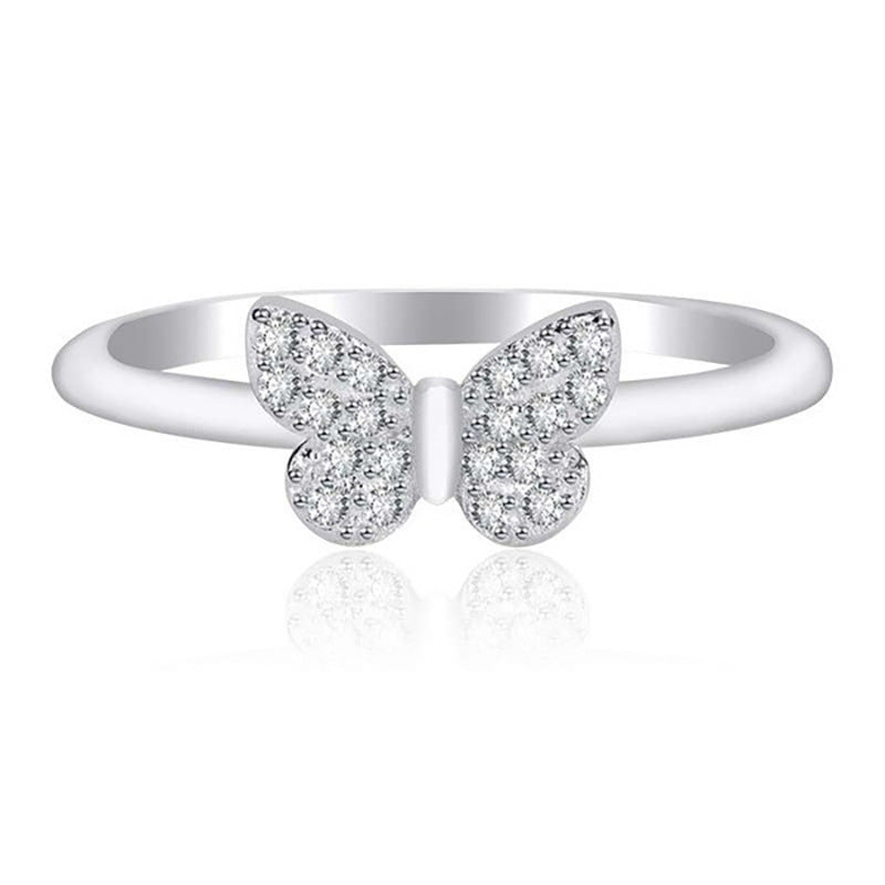 Damenring mit filigranem Schmetterlingsdesign und funkelnden Zirkonia Shop Nory