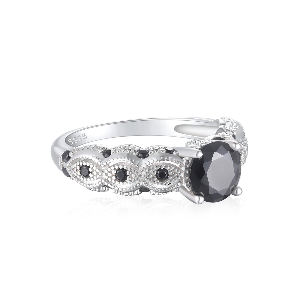 Damen eleganter Ring mit schwarz gefasstem Hauptstein und floralen Verzierungen Shop Nory