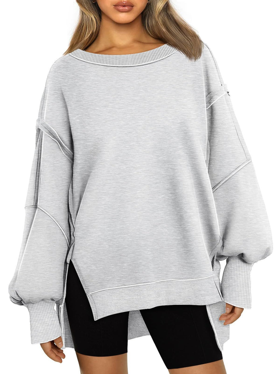 Damen Weiches Longline-Sweatshirt mit Ballonärmeln, seitlichen Schlitzen und geripptem Saum Shop Nory