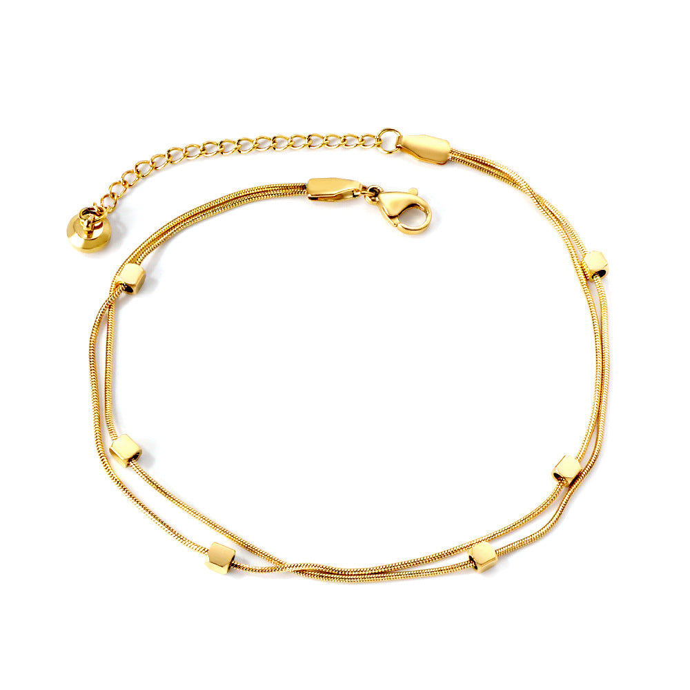 Damen Armband mit floralen Anhängern aus goldplattiertem Edelstahl Shop Nory