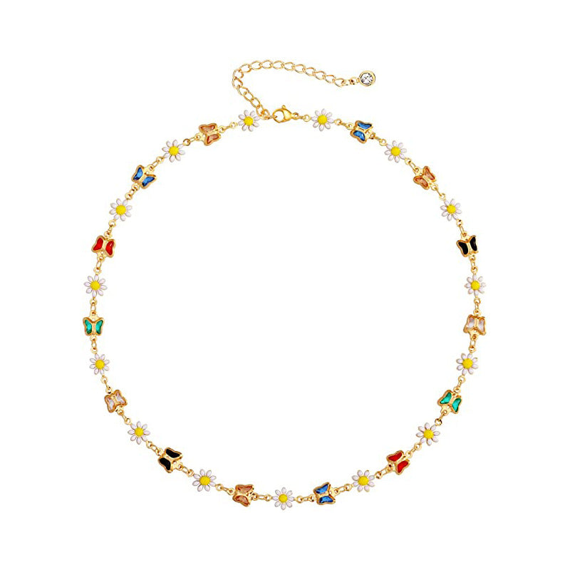 Damen Halskette mit verspielten Schmetterlings- und Gänseblümchen-Elementen Shop Nory