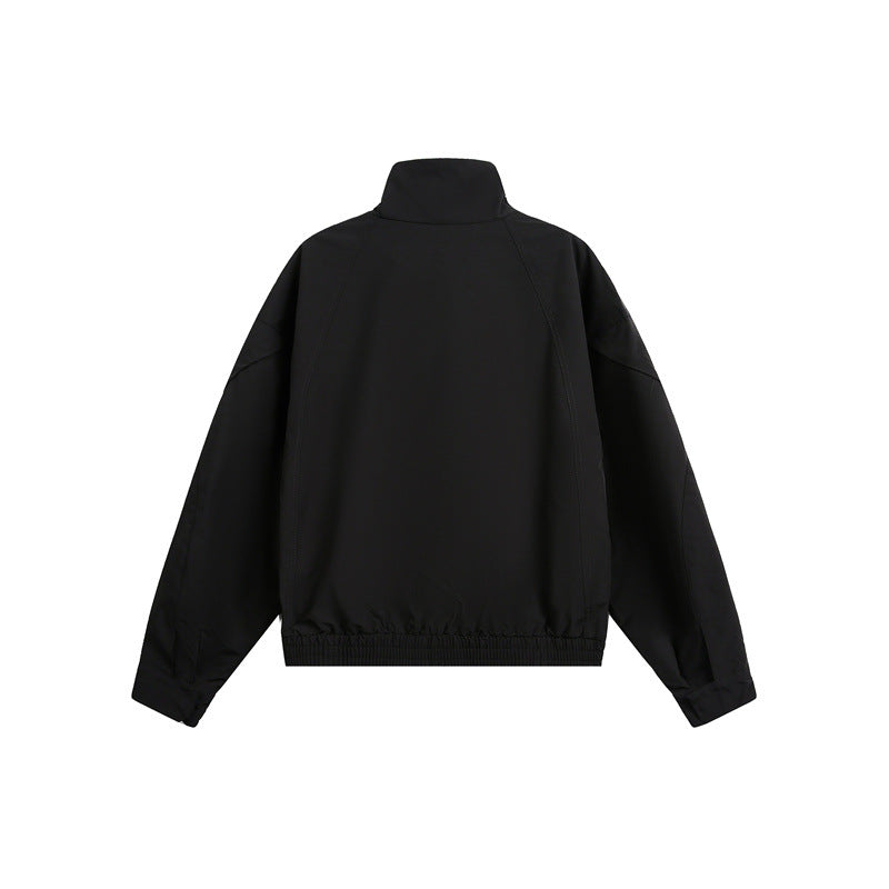 Unisex Kurzblouson im minimalistischen Tech‑Stoff mit Funnelkragen und verdeckter Frontblende Shop Nory