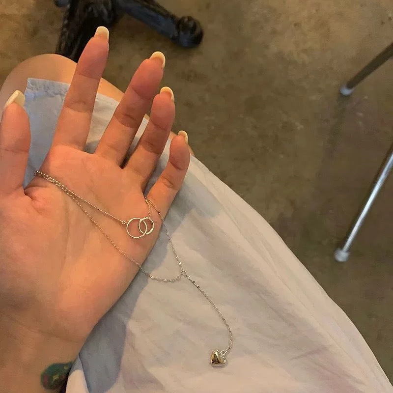 Damen Halskette mit eleganten Ringanhängern und herzförmigem Charm Shop Nory
