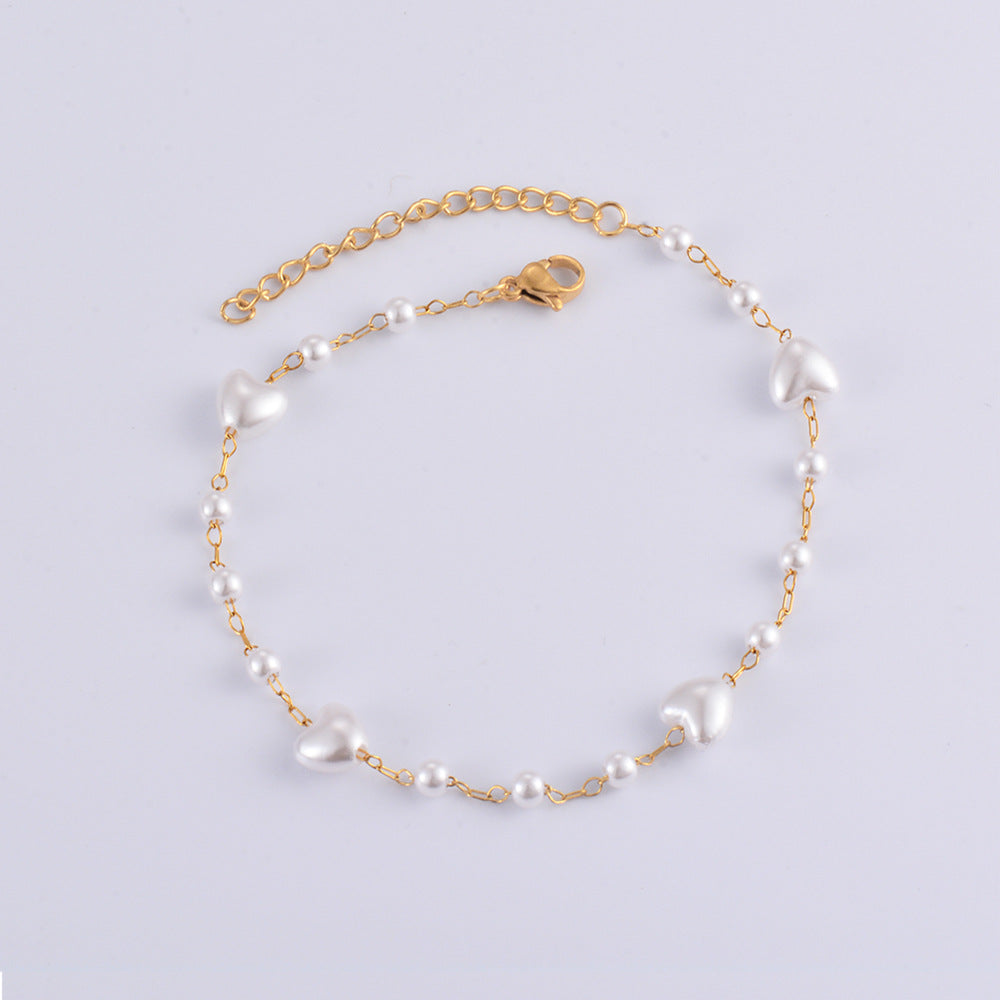 Damen Armband mit herzförmigen Perlen und edler Goldkette Shop Nory