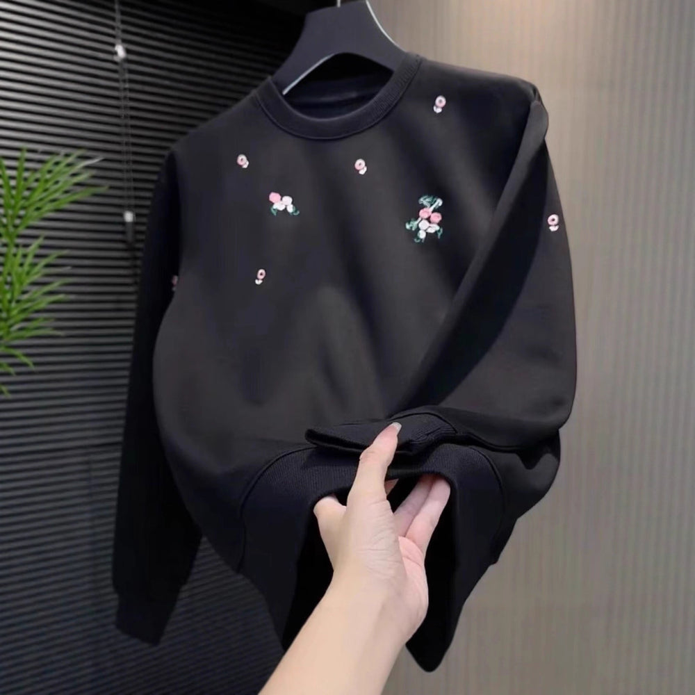 Damen Eleganter Oversized Pullover mit floralem Stickdesign Shop Nory