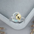 Damen Ring mit stilvollem Muschel-Design und schimmerndem Opal Shop Nory