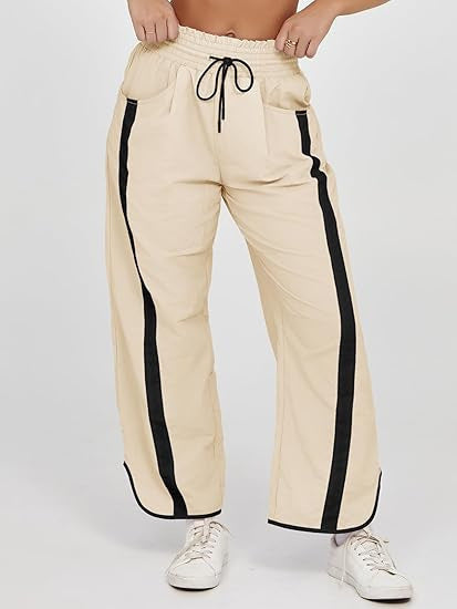 Damen nan relaxte Trackpants mit seitlichem Kontraststreifen, elastischem Smokbund und Eingrifftaschen Shop Nory