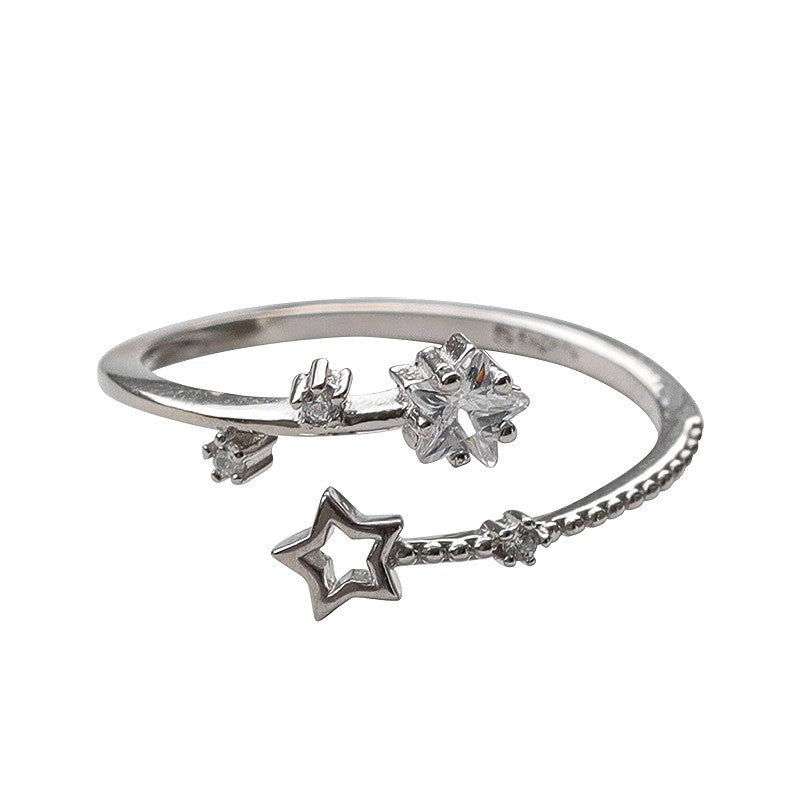 Damen eleganter und zarter Ring mit Stern- und Blütenmotiven Shop Nory