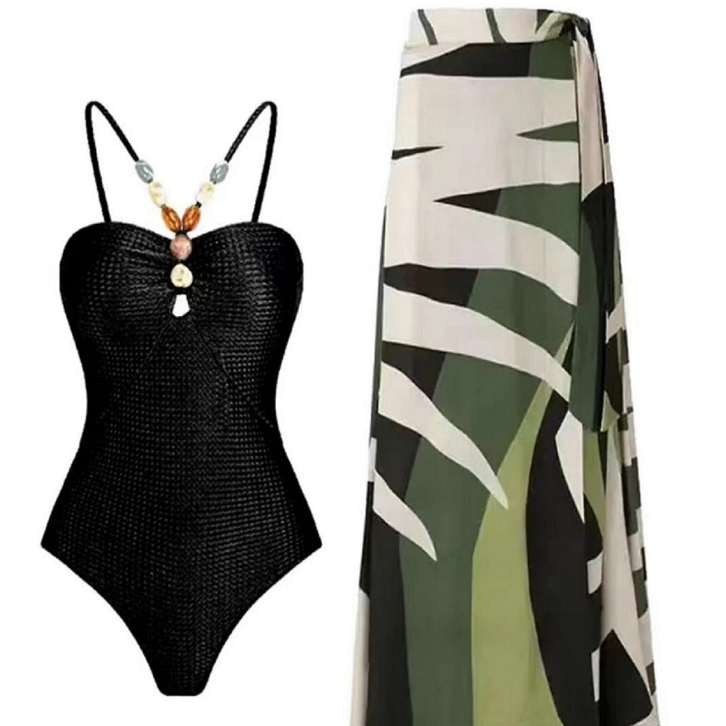 Damen Badeanzug mit elegantem Wickelrock und modischen Schmuckdetails