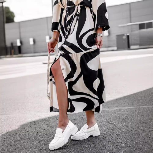 Damen Maxikleid mit modernem Muster und praktischem Taillengürtel