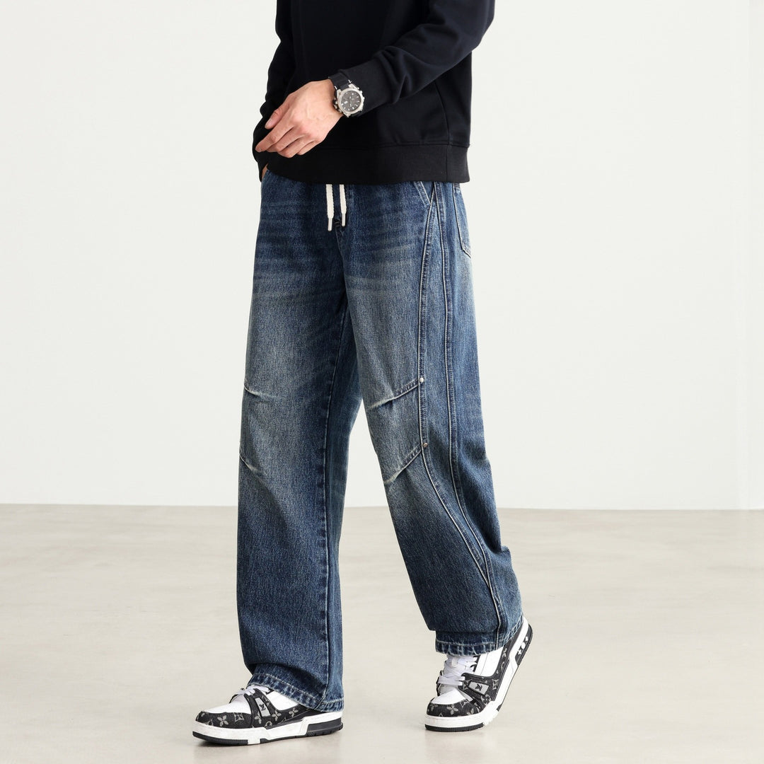 Herren Weite Denim-Hose mit Tunnelzugbund, Paneelnähten und Used-Waschung Shop Nory