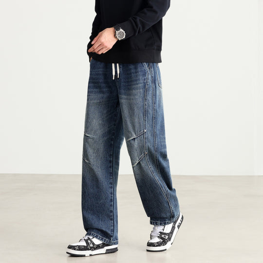 Herren Weite Denim-Hose mit Tunnelzugbund, Paneelnähten und Used-Waschung Shop Nory