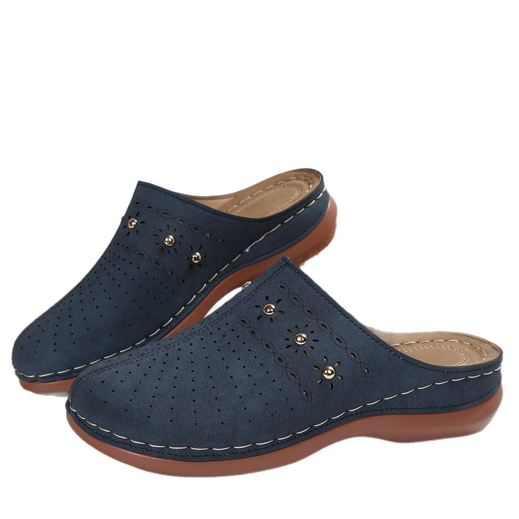 Damen modische Clogs mit luftiger Perforation und eleganter Verzierung