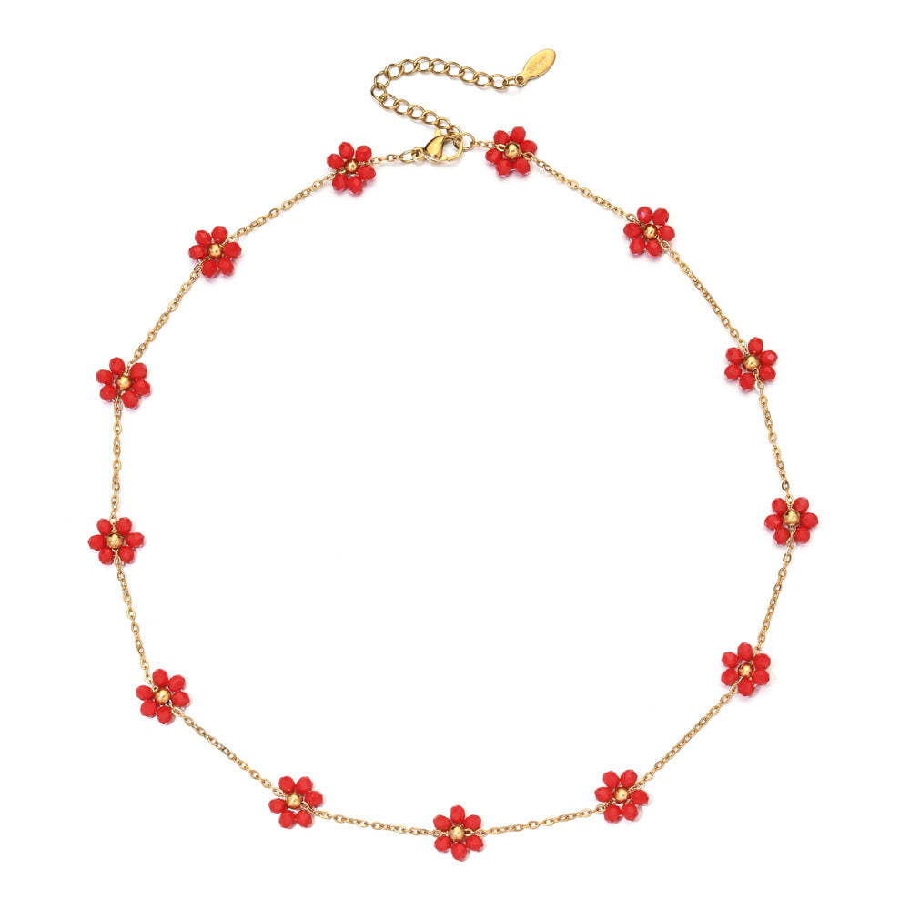 Damen zarte Halskette mit floralen Akzenten und goldfarbener Kettengestaltung Shop Nory