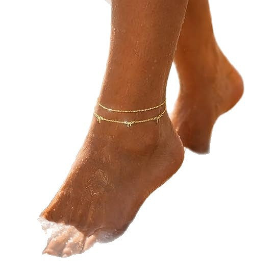 Damen Fußkettchen mit filigranem Schleifen-Design und elegantem Kettenspiel Shop Nory