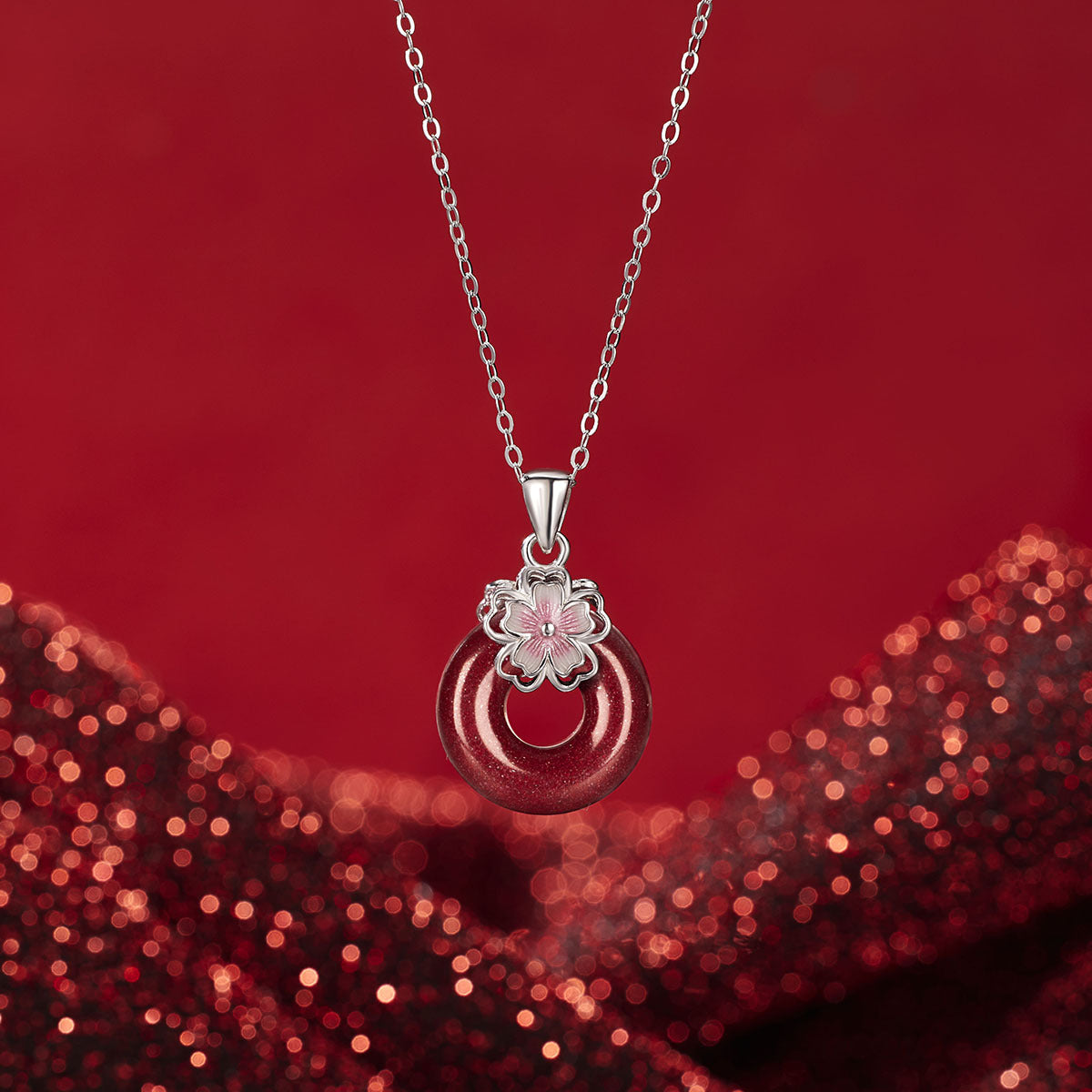 Damen Halskette aus edlem Gold mit blütenförmigem Anhänger und goldener Eye-Catcher Shop Nory