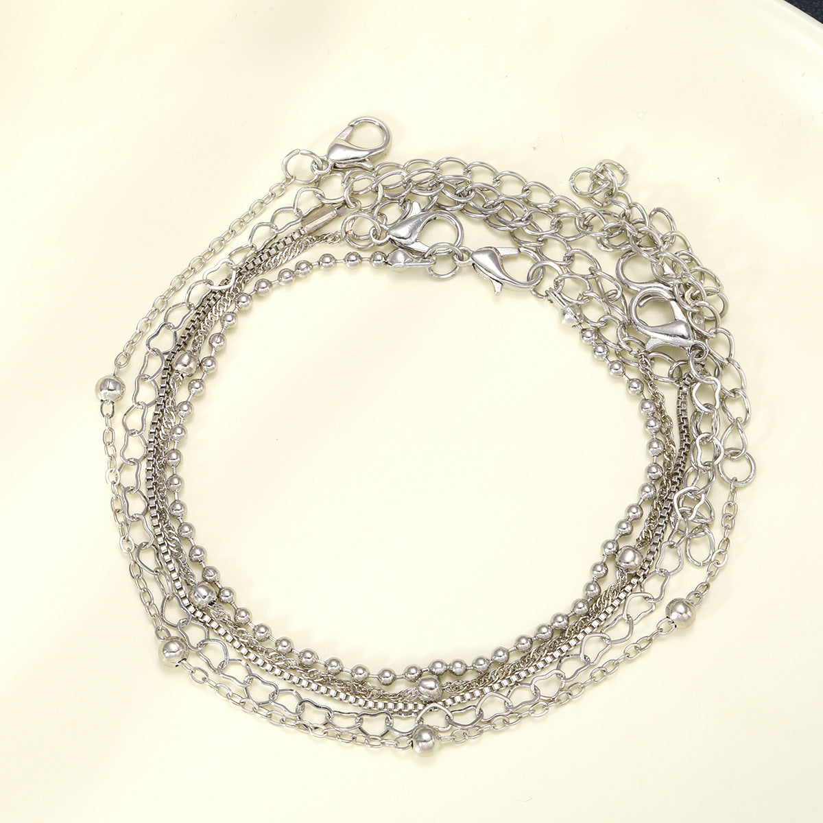 Damen Armreifen-Set mit zarten Herz- und Perlendetails Shop Nory