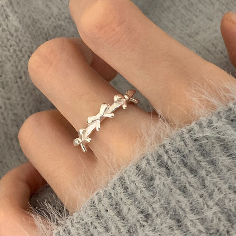 Damen Zierlicher und filigraner Ring mit Schleifenmotiv Shop Nory
