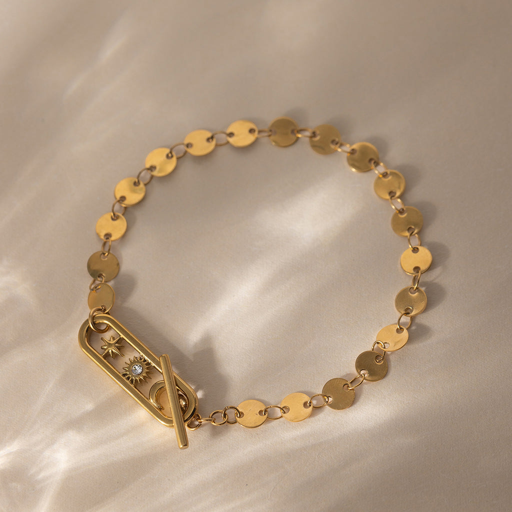 Damen Armband mit eleganten runden Anhängern aus hypoallergenem Edelstahl Shop Nory