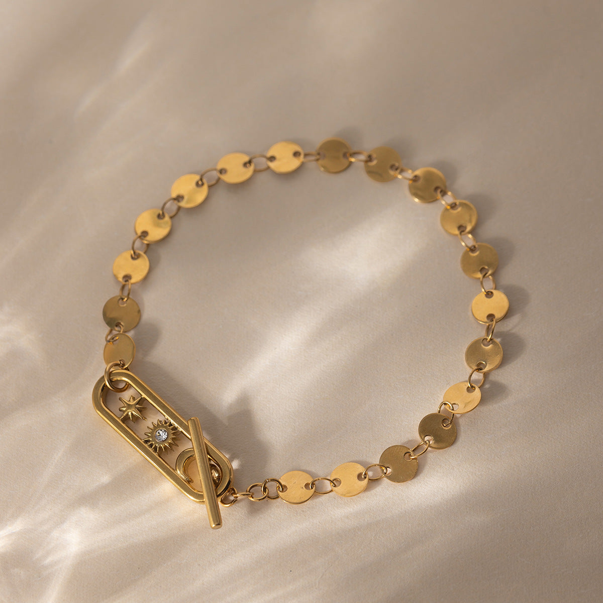 Damen Armband mit eleganten runden Anhängern aus hypoallergenem Edelstahl Shop Nory