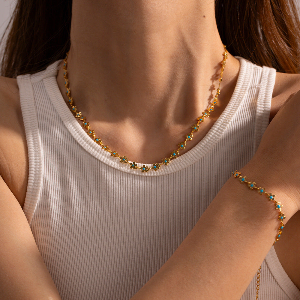 Damen Kette mit zarten Blumenelementen und hochwertiger Edelstahlverarbeitung Shop Nory