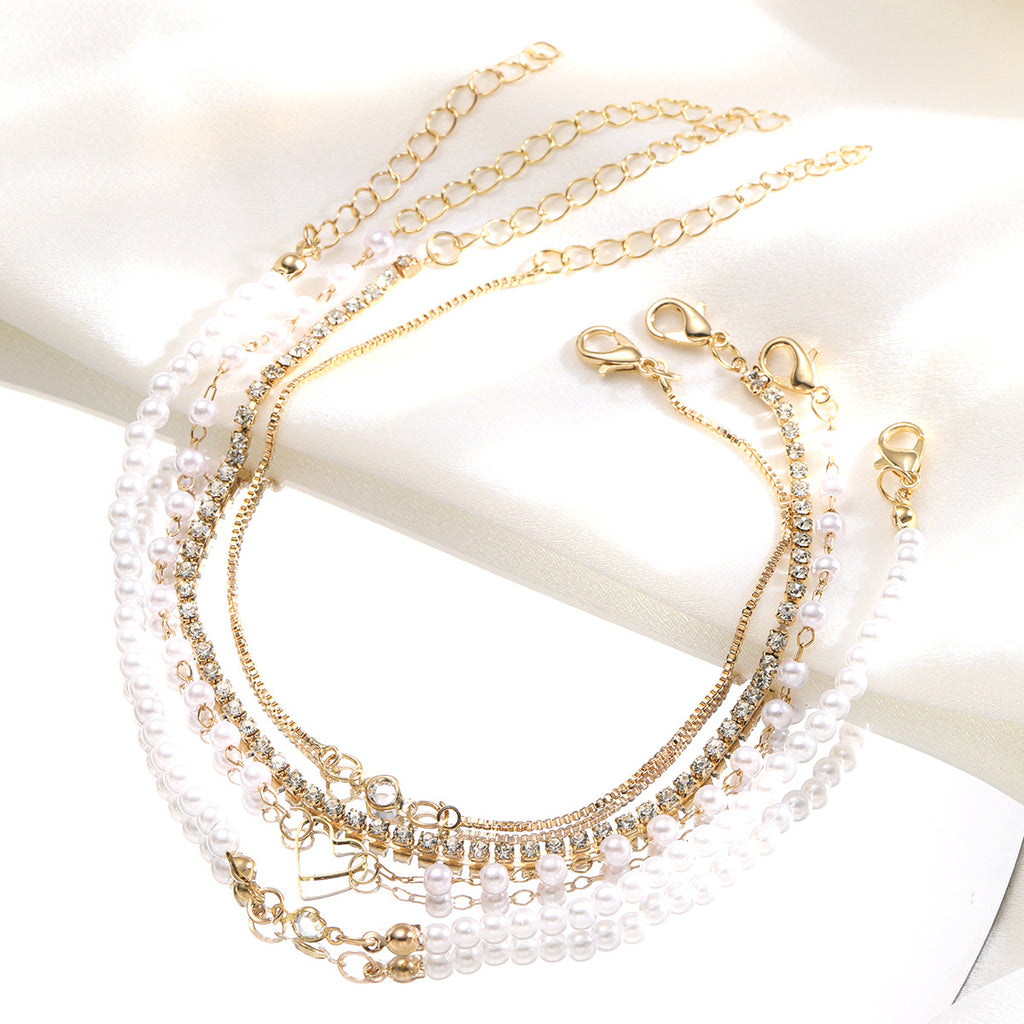 Damen Armband-Set mit feinen Perlen und glitzernden Akzenten Shop Nory