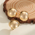 Damen Ohrringe mit klassischem, glänzendem Kugeldesign Shop Nory