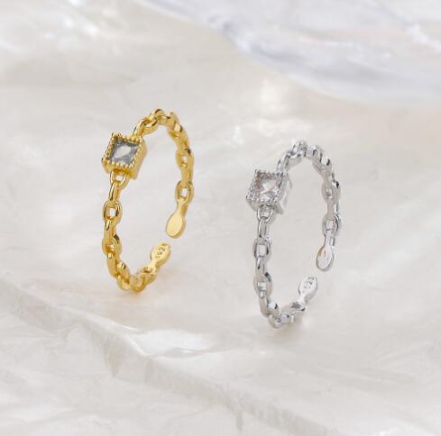 Damen Offener Ring mit elegantem Kettenmotiv und funkelndem Zirkonia Shop Nory