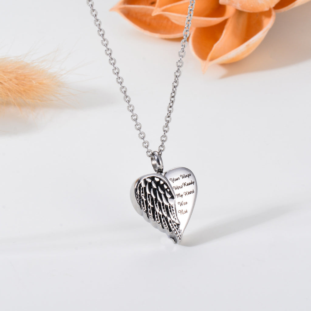 Damen Halskette mit herzförmigem Anhänger und geflügeltem Design Shop Nory