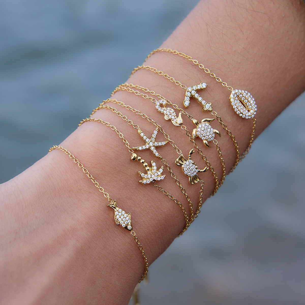 Damen Armreif mit muschelförmigem Design aus hypoallergenem Edelstahl Shop Nory