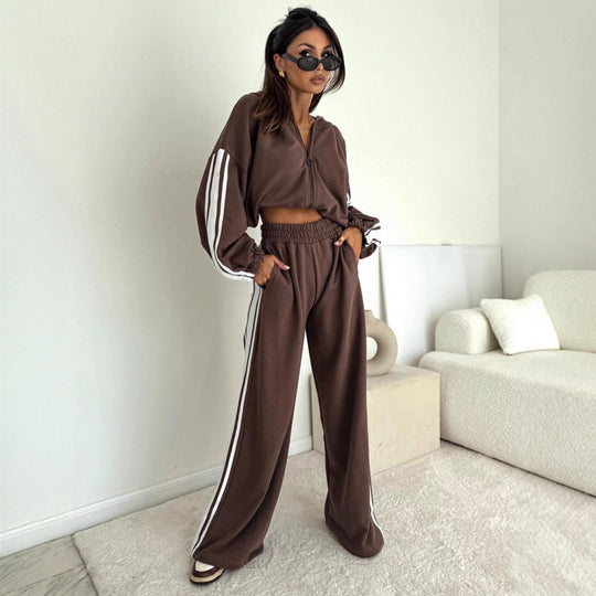 Damen cropped Zip-Hoodie mit voluminösen Ballonärmeln und High-Waist Relaxhose im sportlichen Seitenstreifen-Design Shop Nory