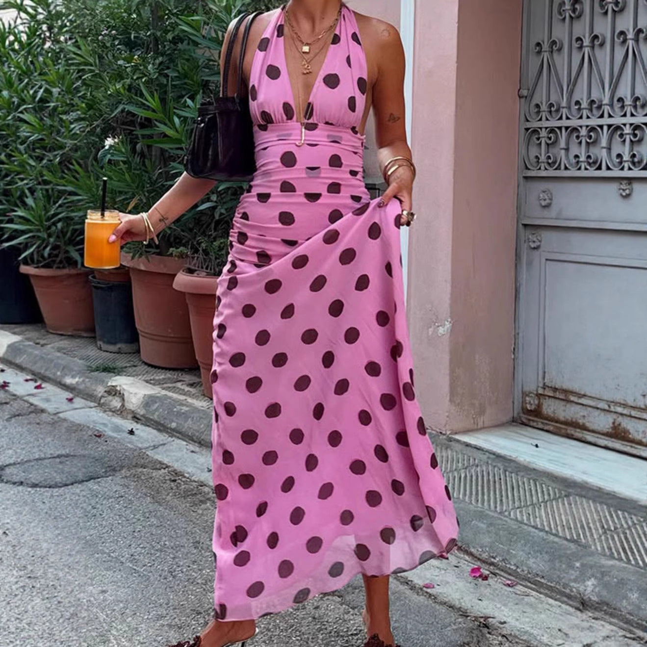 Damen Elegantes Maxikleid mit Punkten und tiefem V-Ausschnitt