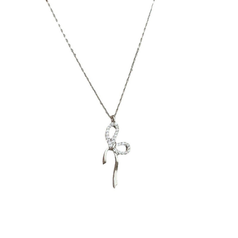 Damen Halskette mit elegantem Schleifenanhänger Shop Nory