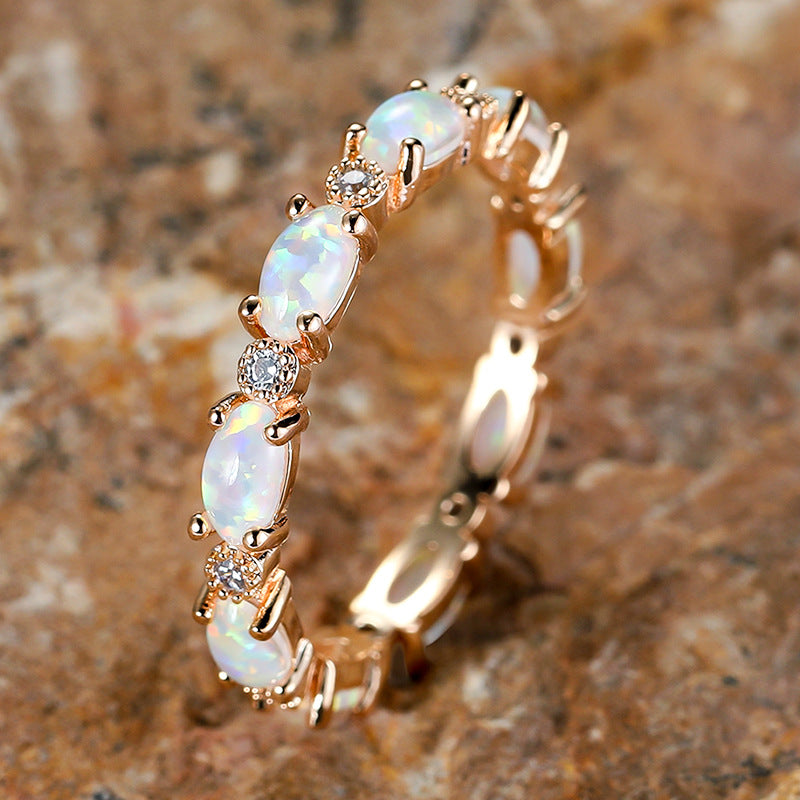 Damen Ring mit funkelnden Opalsteinen und filigranem Design Shop Nory