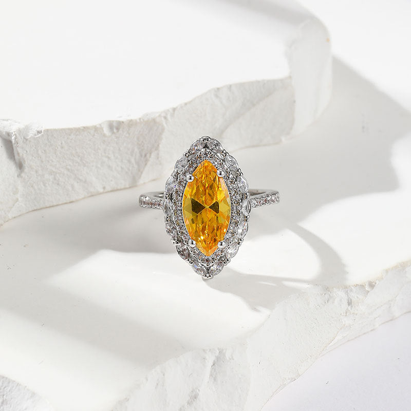 Damen eleganter und funkelnder Ring mit gelbem Zirkonia Shop Nory